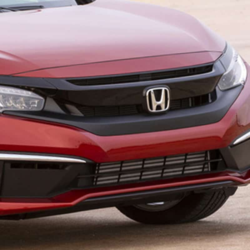 Image of a red Honda car. Concept image of vehicle we service for auto repair and maintenance at Enright Automotive.