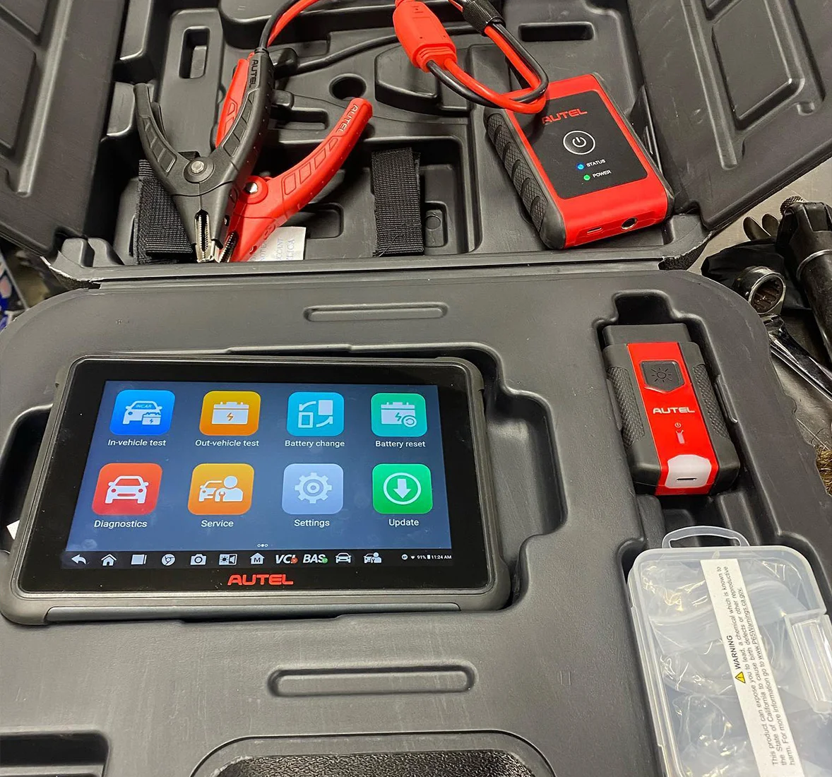 Image of scanner and diagnostics tool. Concept image of vehicle diagnostics and digital inspections at Enright Automotive.