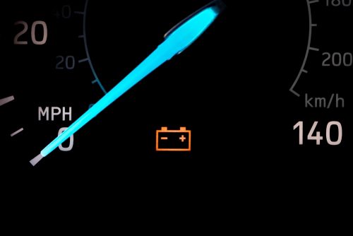 Battery Light Issues in Alexandria, OH by Enright Automotive: A close-up view of an illuminated car battery warning light on a dashboard, emphasizing the need for diagnostic inspection and repair to ensure reliable vehicle operation.